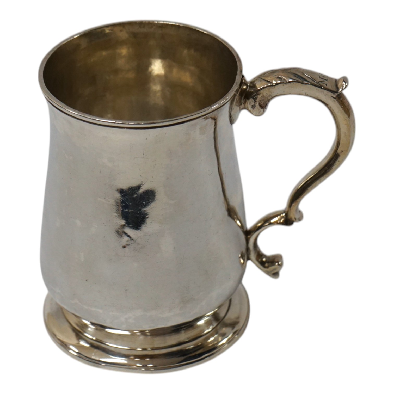 A George III silver baluster mug, overstruck maker's mark, Benjamin Montague?, London, 1780, height 91mm, 5.4oz. Condition - fair